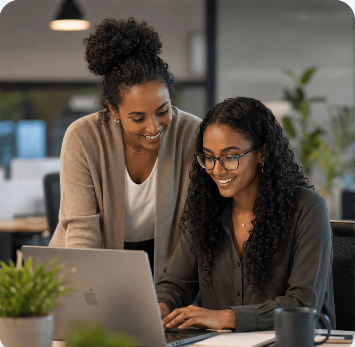Business team collaborating around a modern workspace